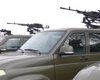 Еще с заводской краской: в Торезе боевики показали новую роту из российских УАЗов
