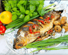 Запеченный карп с ароматными травами и лимоном: праздничный рецепт