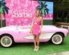 Марго Роббі в мінісукні від Valentino з'явилася на фотосесії з кастом фільму "Барбі"