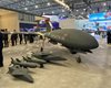 "Умные" ракеты, дрон REACH-M и полигон для БПЛА: что показали на военной выставке в ОАЭ (фото)