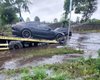 Не подолав водну перешкоду: у Києві в негоду втопили дорогий Porsche (фото, відео)