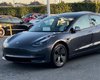 Американец купил новый электромобиль Tesla всего за $13 620: как ему это удалось
