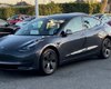 Американец купил новый электромобиль Tesla всего за $13 620: как ему это удалось