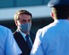 Президент Бразилии проверился на коронавирус и впервые вышел к людям в маске
