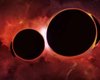 Дві надмасивні чорні діри скоро зіткнуться: наслідки відчуватимуться на Землі
