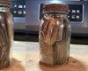 Настоящий клад: мужчина выкопал банку с раритетными деньгами (фото)