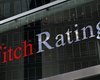Fitch понижает рейтинги флагманов бизнеса Ахметова и Фирташа