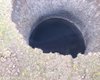 Дыра в ад: в Сибири обнаружили гигантскую воронку от подземного взрыва газа