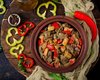 Куряча печінка з овочами: рецепт смачної та бюджетної страви