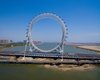 В Китае посреди реки открылось гигантское колесо обозрения