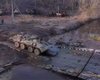 РосСМИ показали переправу через реку в районе Изюма, заваленную техникой ВС РФ (видео)