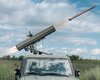 Ракеты летят на 9 км: украинские военные превратили внедорожник в РСЗО (фото)
