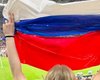 На матче ПСЖ-Арсенал появился российский флаг: его сделали из пакетов