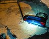 Водитель успел выпрыгнуть: в Одессе автомобиль провалился под землю (фото)