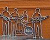 В России открыли первый памятник группе Beatles