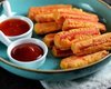 Крабовые палочки, фаршированные грибами: как приготовить интересную закуску