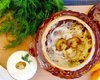 Нестандартний рецепт картопляних дерунів із грибами в горщику
