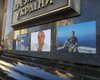 Участники "Марша УПА" обклеили здание Офиса президента фотографиями погибших бойцов