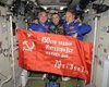 Российские космонавты вывесили снаружи МКС "Знамя Победы" (фото)