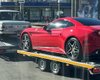 Город контрастов: в Киеве заметили автовоз с раритетным Ferrari и "Запорожцем" (фото)