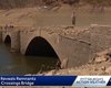 В США из-за сильной засухи высохло озеро, откуда показался затерянный город и мост (видео)