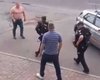 Ударив в обличчя і заліз на капот: у Києві чоловік влаштував бійку з поліцейськими (фото, відео)