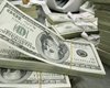 Доллар дорожает по отношению ко всем мировым валютам из-за решения Fitch по Греции
