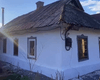 Дом достался в подарок: украинцы сбежали из города в село (фото)