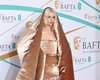 Аня Тейлор-Джой вийшла на червону доріжку в ковдрі