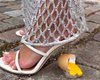 Дом моды Loewe выпустил босоножки с каблуком в виде раздавленного яйца