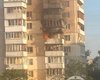 Начался пожар: РФ атаковала Киев крылатой ракетой, повреждена многоэтажка (фото, видео)