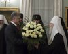 Порошенко подарил Филарету букет белых роз