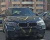 Мародер із РФ намагався оформити документи на вивезений із України BMW