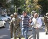 Задержан мужчина, угрожавший подорвать боевую гранату в Кабмине (фото, видео)