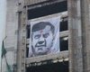 В Киеве сегодня ночью повесили баннер Януковича с красной точкой на лбу