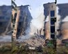 Обрушился целый подъезд: россияне сбросили бомбу на многоквартирный дом в Херсоне (фото)
