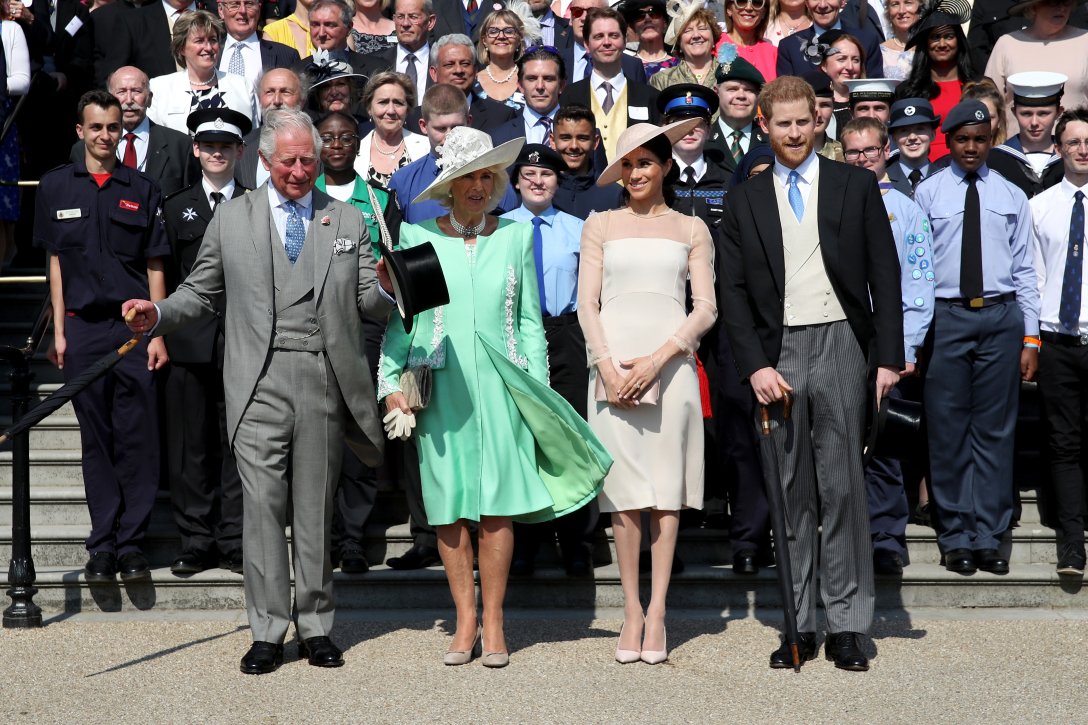 Король Чарльз ІІІ, королева Камілла, Меган Маркл та принц Гаррі