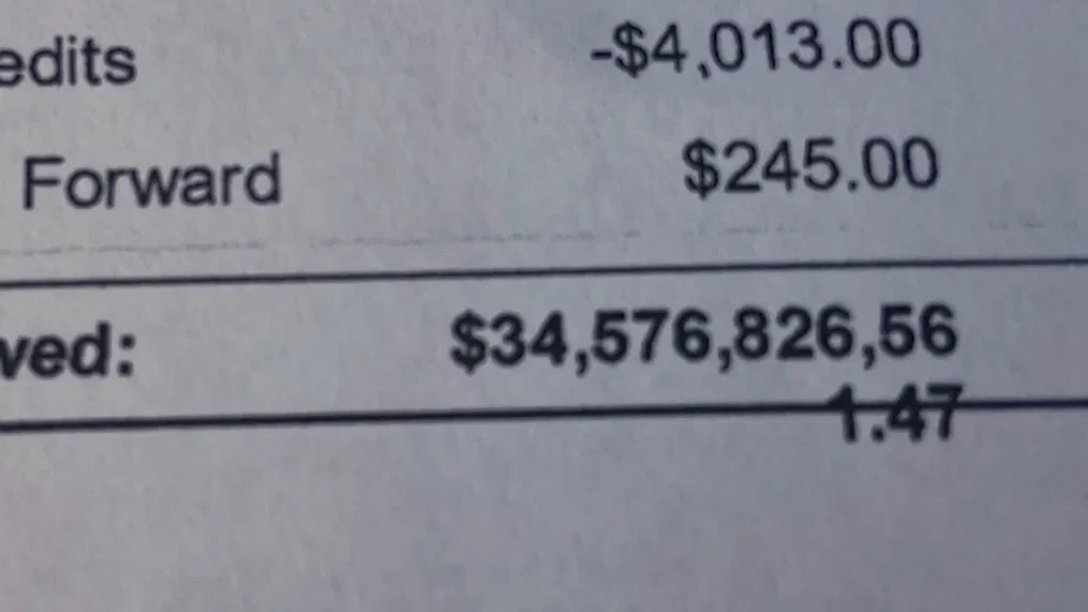 Чоловік отримав рахунок на 34 млрд доларів, рахунок, гроші, заборгував грошей, помилка в комп'ютері, прострочений платіж, відсотки,
