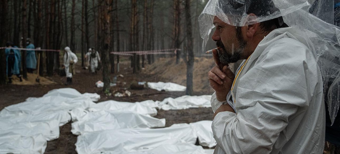 ексгумація ізюм, Євген малолєтка фото, воєнні злочини, ізюм трупи