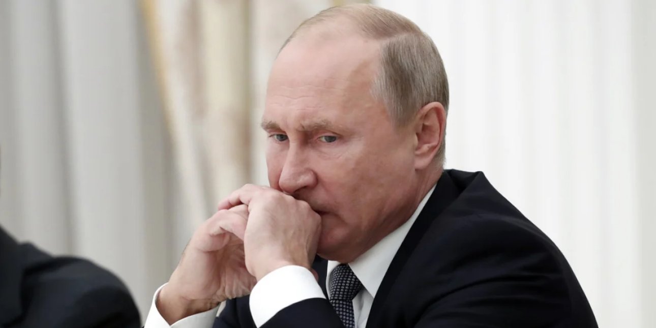Путин