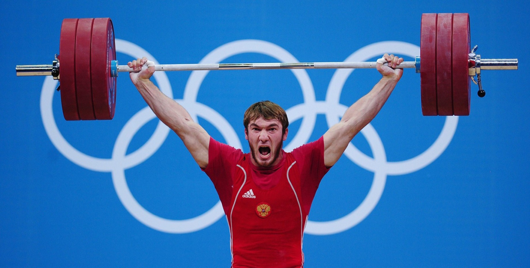 Спортсмены на соревнованиях по тяжелой атлетике. Апти Аухадов тяжелая атлетика.