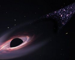 Впервые обнаружена убегающая из галактики огромная черная дыра: скорость 3,6 млн км/ч (фото)