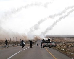 Войска НПС Ливии захватили родной город Муаммара Каддафи 