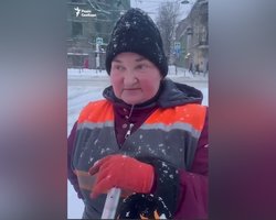 "Над головой пролетело": смелая дворник продолжила убирать снег после удара "Шахеда" (видео)