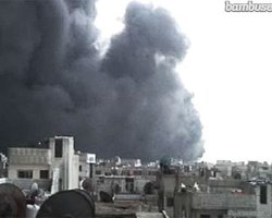 В повстанческом сирийском городе Хомсе начался гигантский пожар