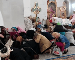 Віряни прикривали одне одного: ЗМІ дізналися подробиці удару РФ по церкві в Херсоні (фото)