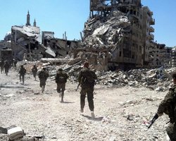 Войска Асада вытеснили сирийских повстанцев из Хомса