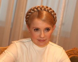 Тимошенко раздает обещания избирателям Ющенко, Яценюка и Тигипко