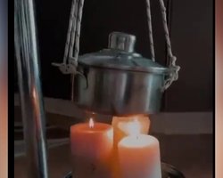 Свічки, пальники та сухий спирт: українці показали, як готують їжу при відключеннях світла (відео)