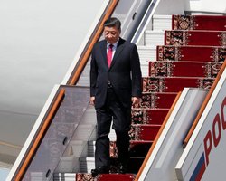 Си Цзиньпин прилетел в Россию на встречу с Путиным (фото)